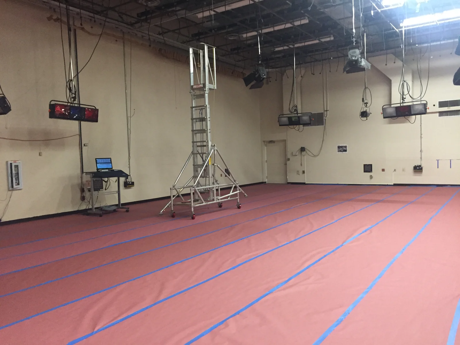 Studio floor plan marked beneath the existing lighting grid