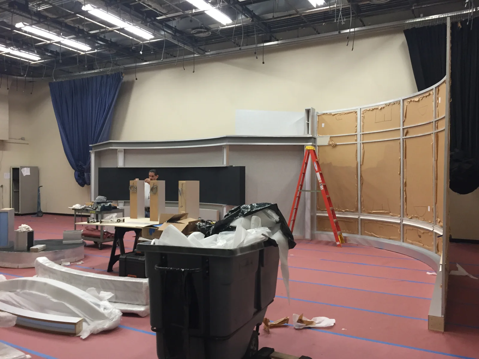 Wall structures and display openings during assembly