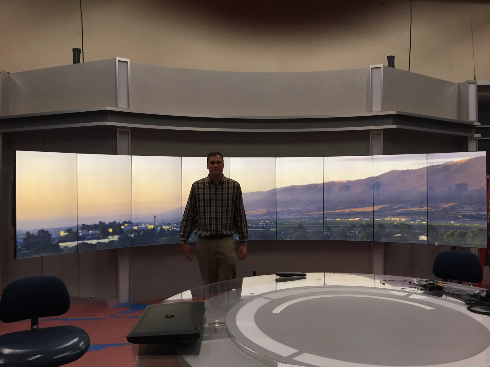 Multi-panel scenic display showing a landscape image
