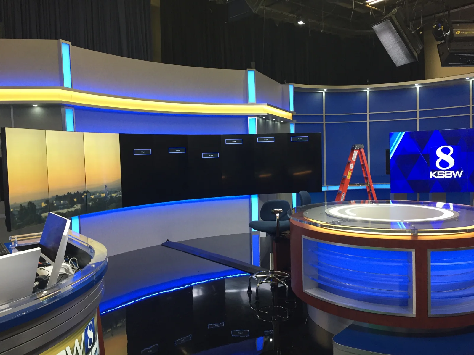 Finished curved desk, scenic lighting, and KSBW display