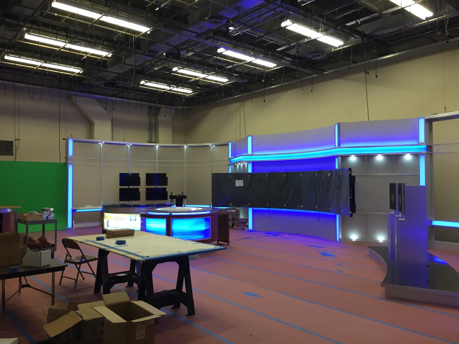 Illuminated scenic elements with work tables still in place